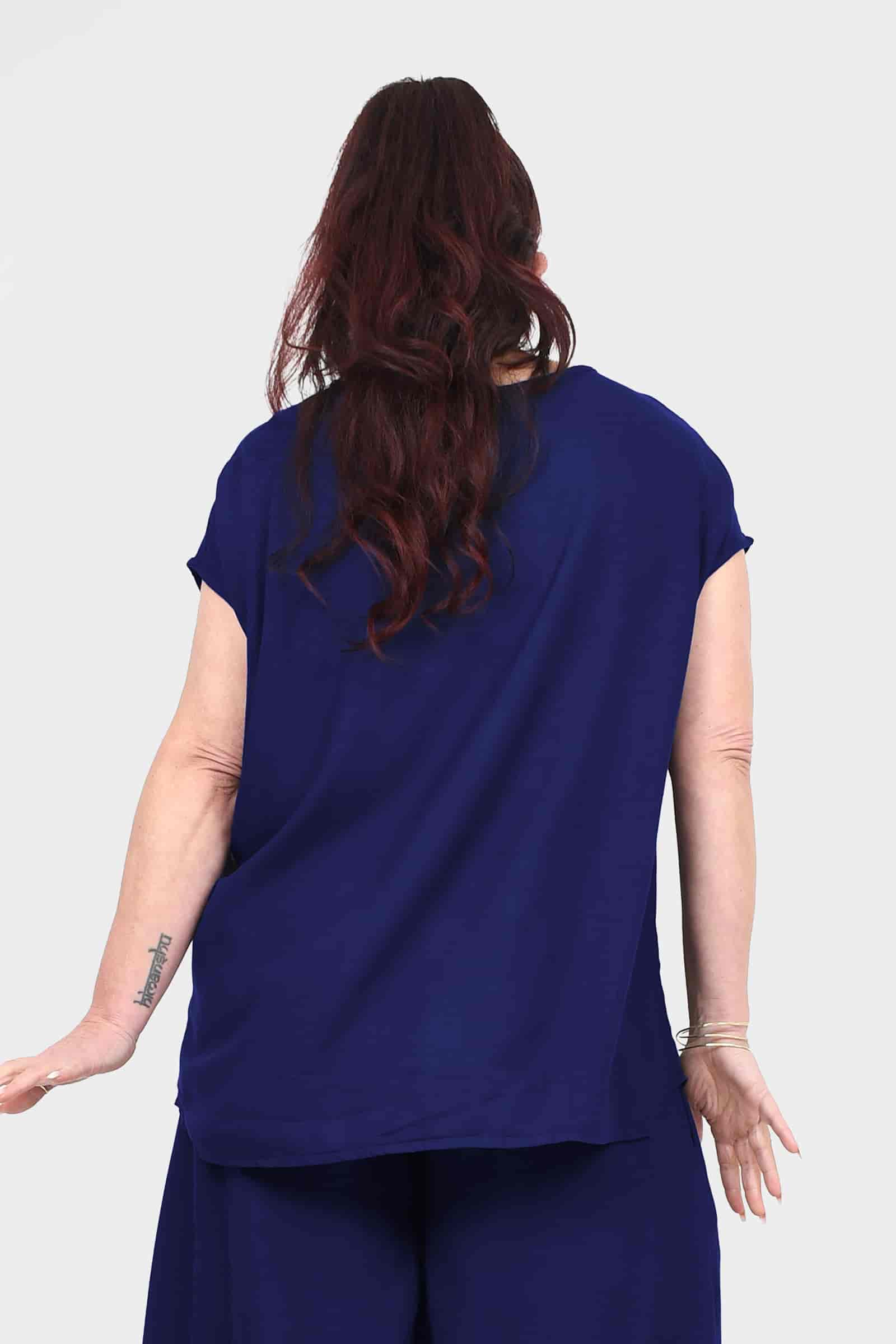 Dark blue Nora top back view with short sleeves and round neckline, relaxed fit.