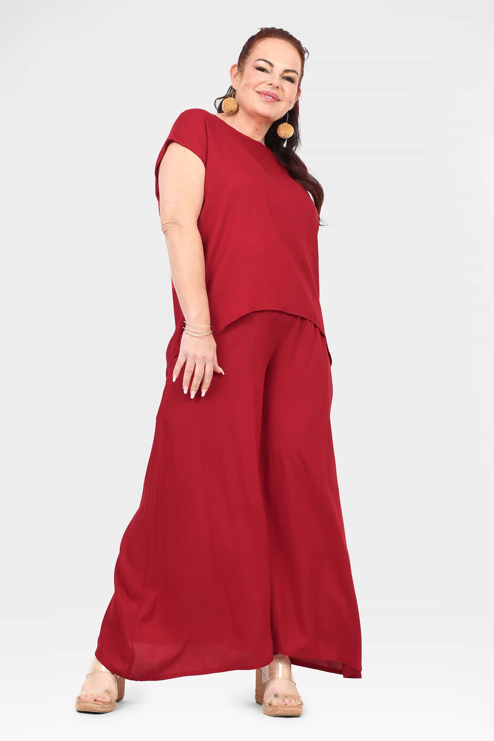 Dark red wide-leg pants, front view with gathered elastic waist
