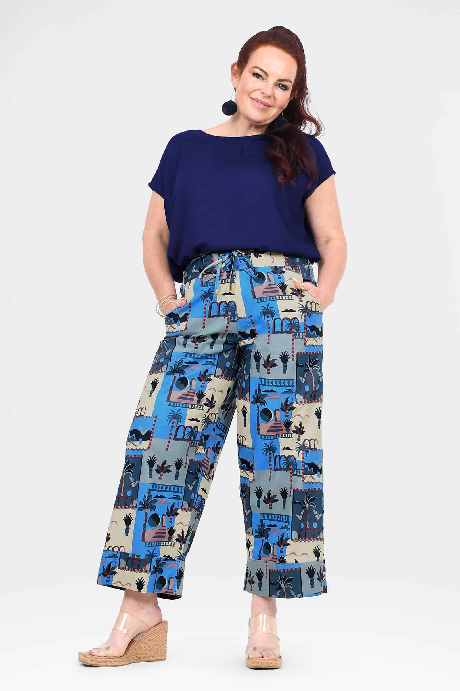 Tully pants with blue-and-cream landmark print, wide-leg elastic waistband