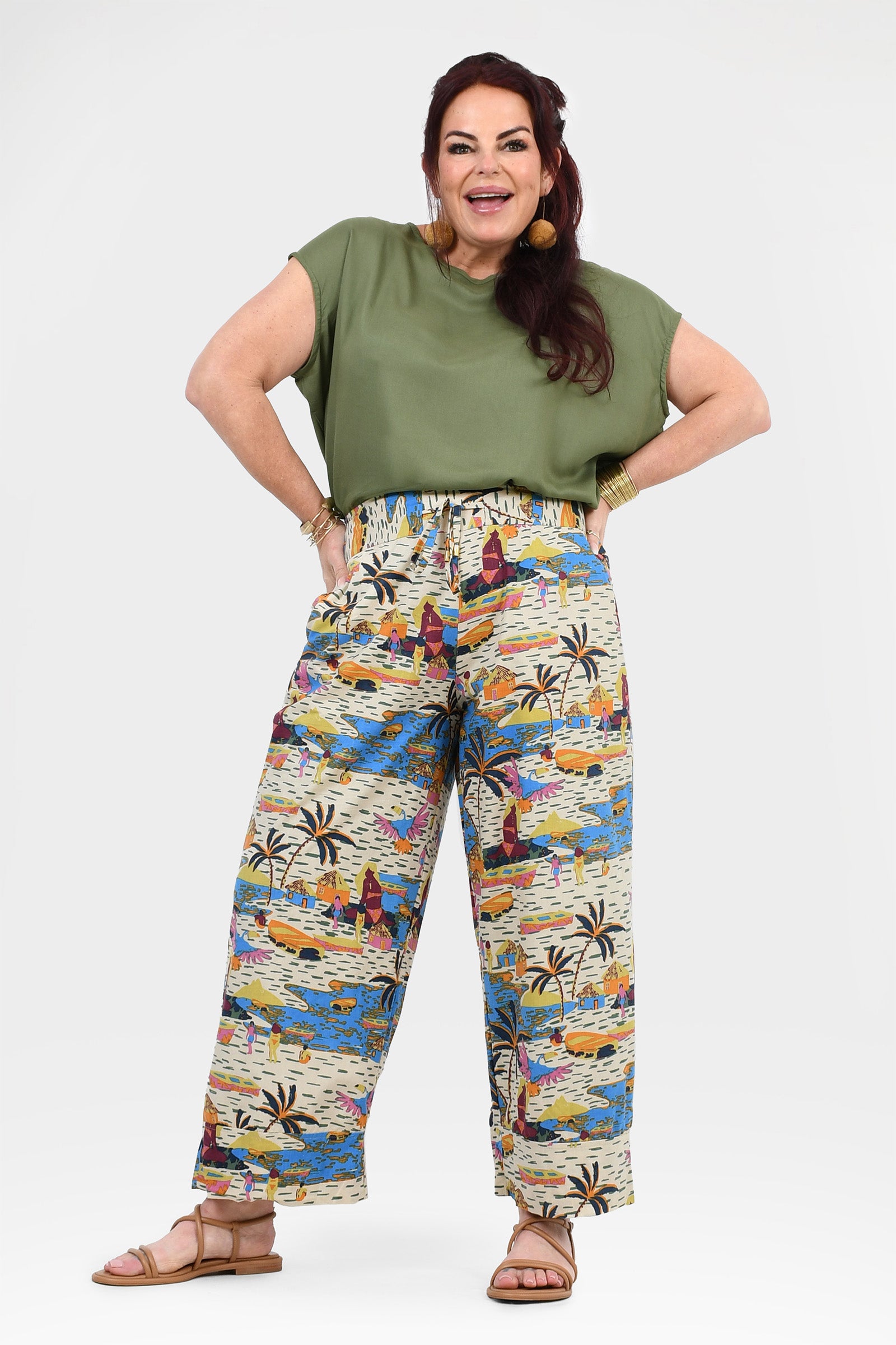 Colorful printed pants with off-white base, wide-leg fit