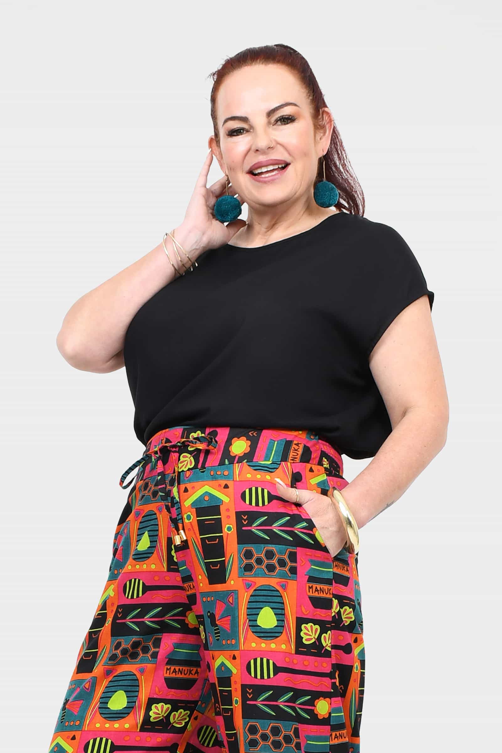 Black short-sleeve crew-neck top with soft drape