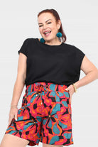 Black short-sleeve pullover top with crew neckline and relaxed fit