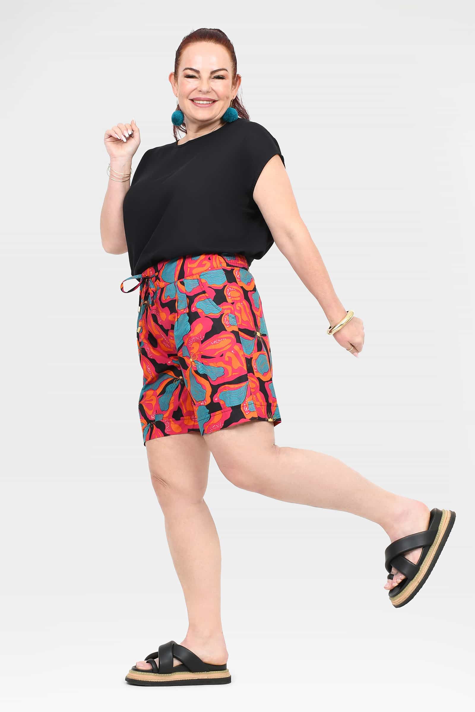 Tully shorts with colorful abstract print, drawstring elastic waist, side view