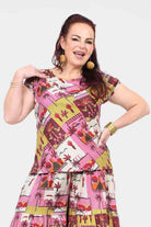 Pink patchwork print T-shirt with crew neck and ruffled hem, full front view