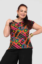 Printed crew-neck T-shirt with bright geometric and motif pattern, short sleeves