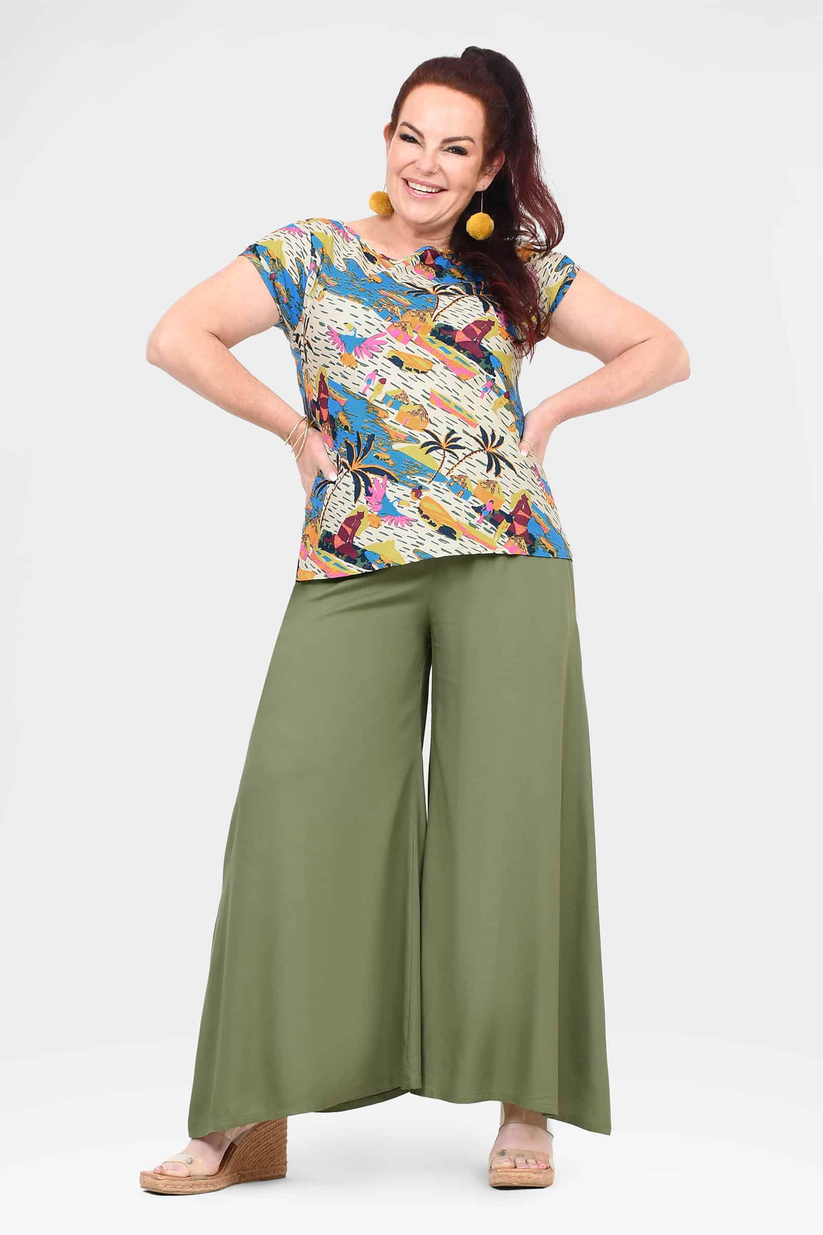 Green wide-leg pants with flowing drape and long culotte length