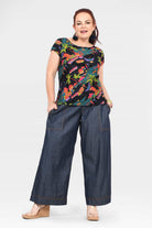 Dark blue denim long wide-leg pants with patch pockets and cuffed hems