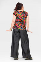 Black denim wide-leg long pants, back view, contrast stitching and wide cuffs