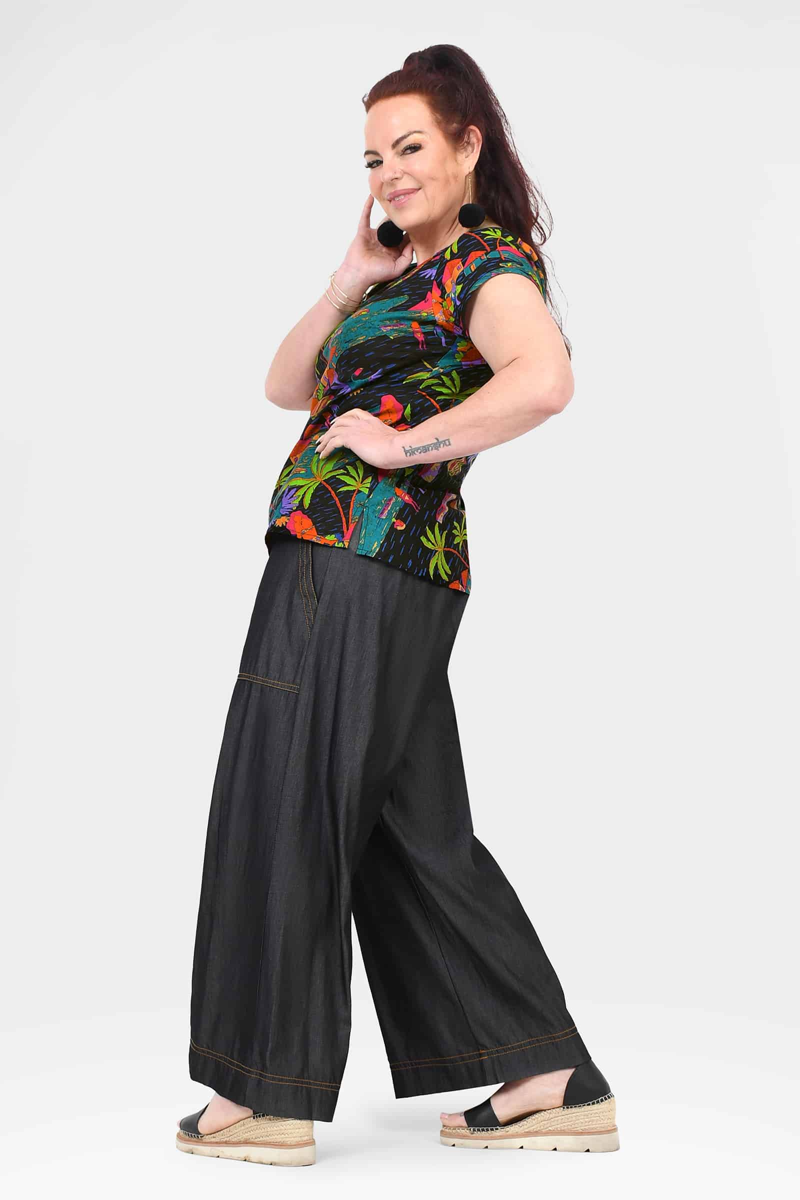 Black denim long pants with relaxed wide-leg cut and contrast-stitched cuffs