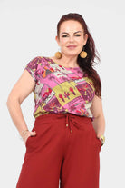 Levi T-shirt, short-sleeve crew neck in Casablanca Pink with tropical graphic print