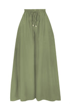 Pistachio green wide-leg pants with elastic waist and drawstring, relaxed full length