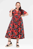 Midi dress with V-neck, short sleeves, gathered waist, and colorful abstract floral print