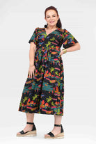 Printed midi dress V-neck with short sleeves and gathered waist, tropical palm pattern