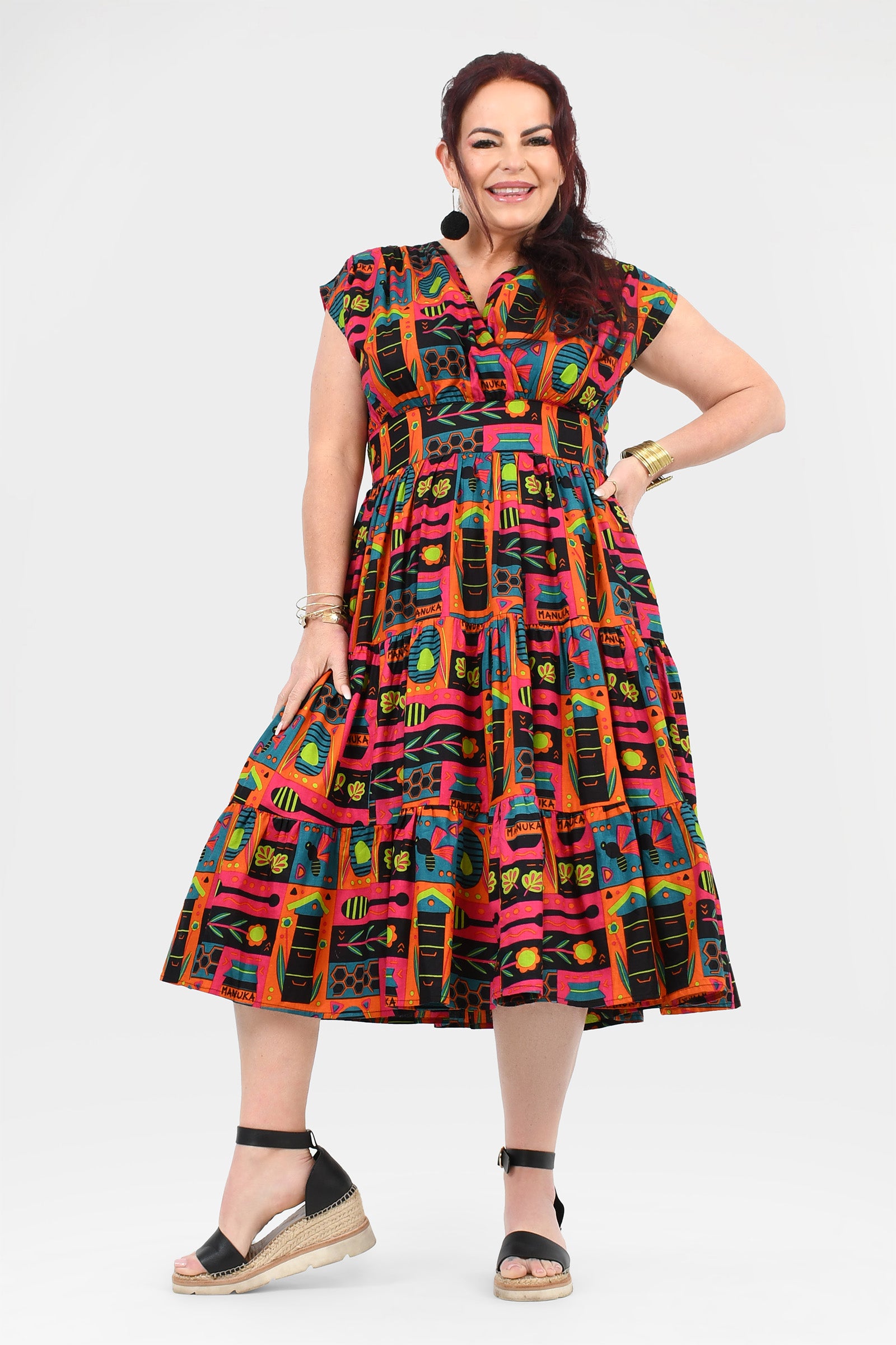 Colorful printed midi dress with collared V neckline and flared skirt