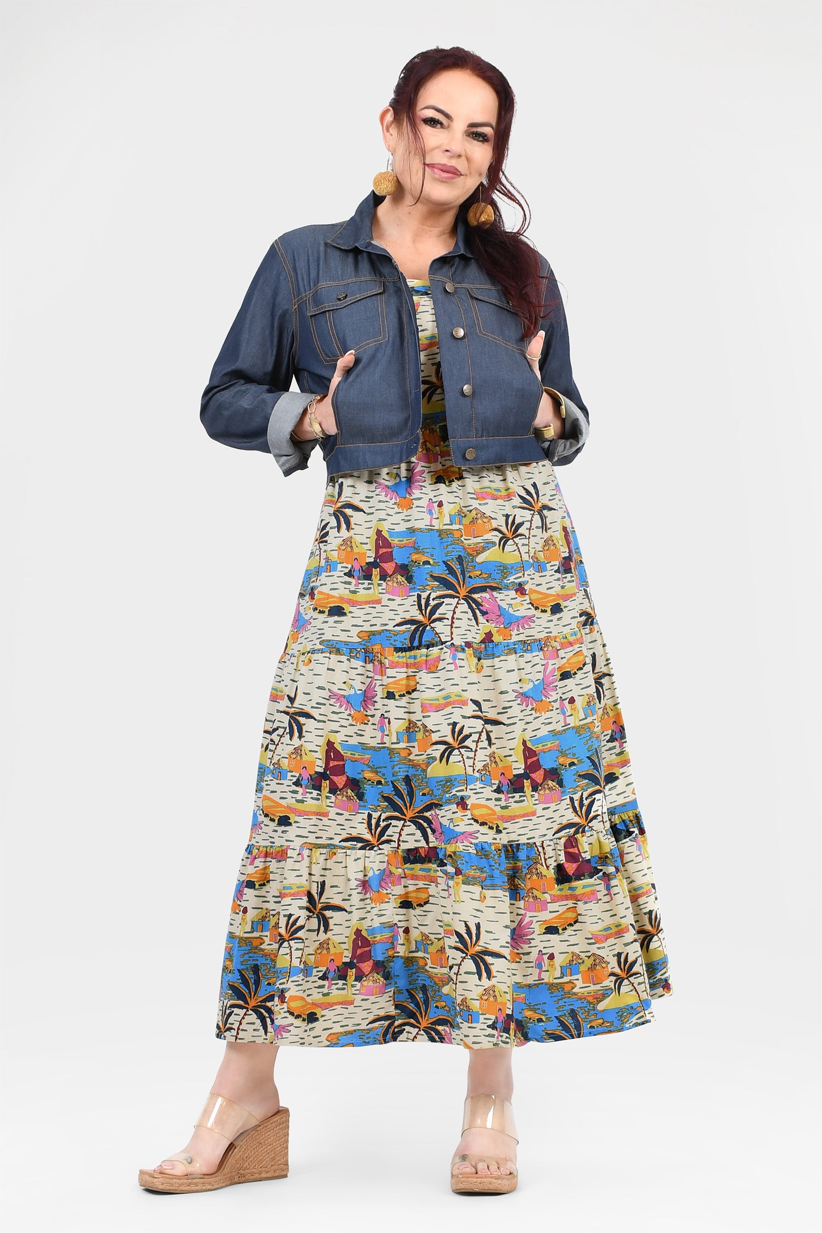 Multicolor tropical print maxi dress with sleeveless scoop neck and flared skirt