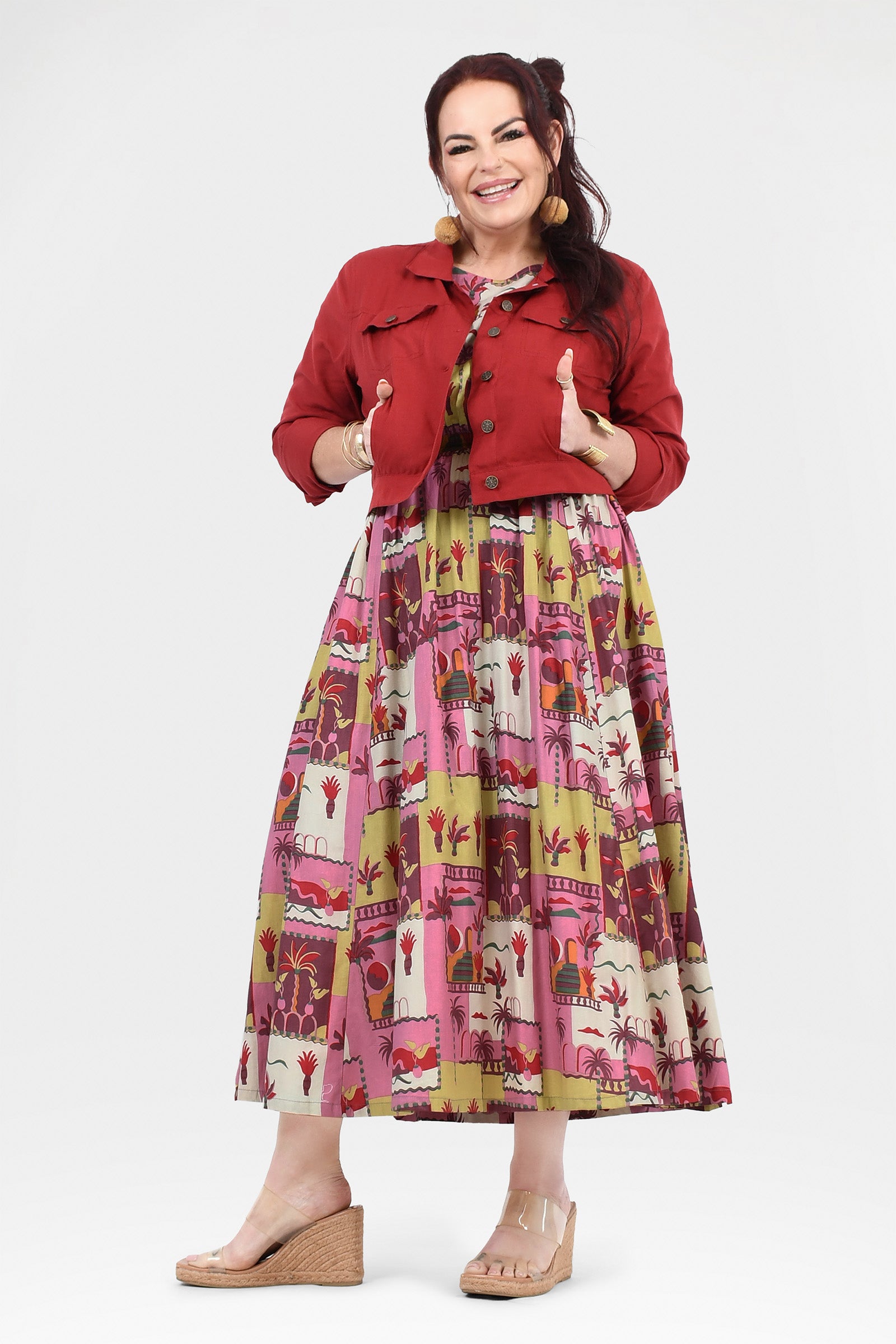 Pink long dress with colorful animal and cactus print, short sleeves and flared hem