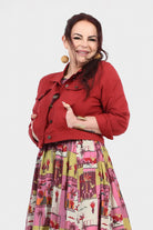 Dark red denim-style jacket with button front, stand collar, and flap pockets