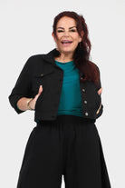 Black Hendrix cropped jacket with button front, flap pockets, and structured collar