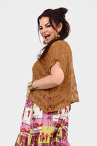 Caramel popcorn knit sleeveless top with short fringed sleeves