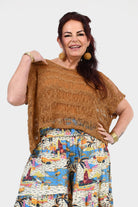 Caramel popcorn knit sleeveless top with textured fringe hem