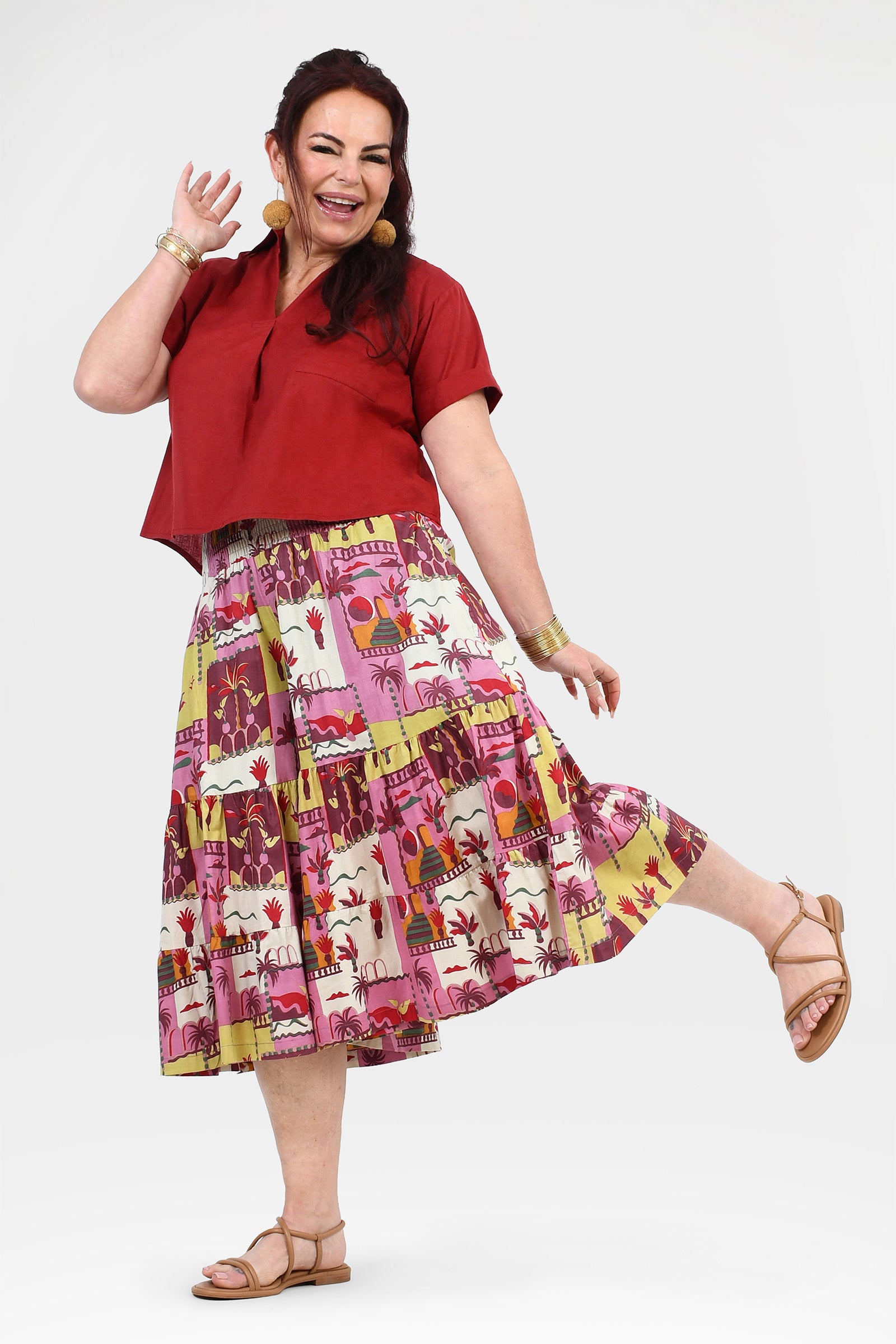 Multicolor illustrated tiered 3/4 pants with pink and cream background