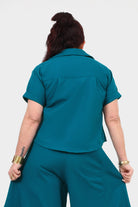 Dark teal back view V-neck short-sleeve top