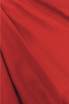 Dark red woven fabric close-up with subtle texture and fine grain.