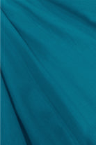 Dark teal fabric close-up for V-neck short-sleeve top