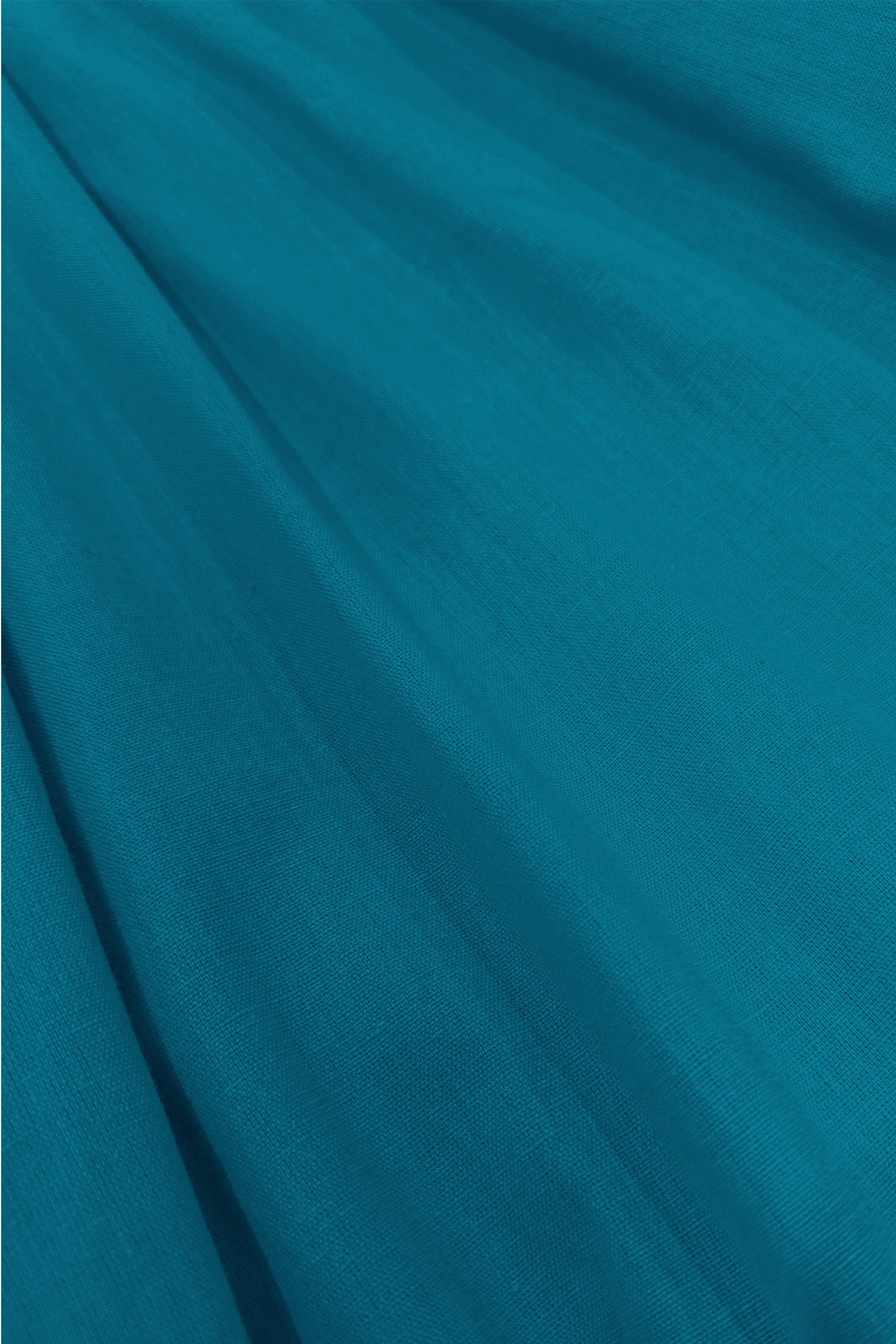 Dark teal woven fabric texture for wide-leg pants