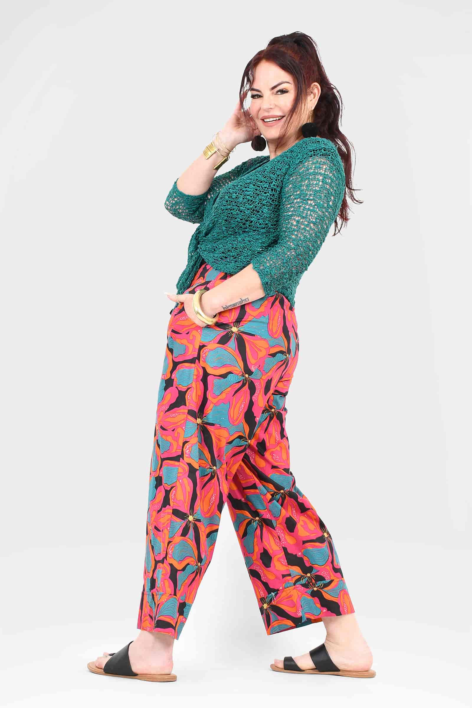 Wide-leg pants with colorful leaf print and relaxed straight legs
