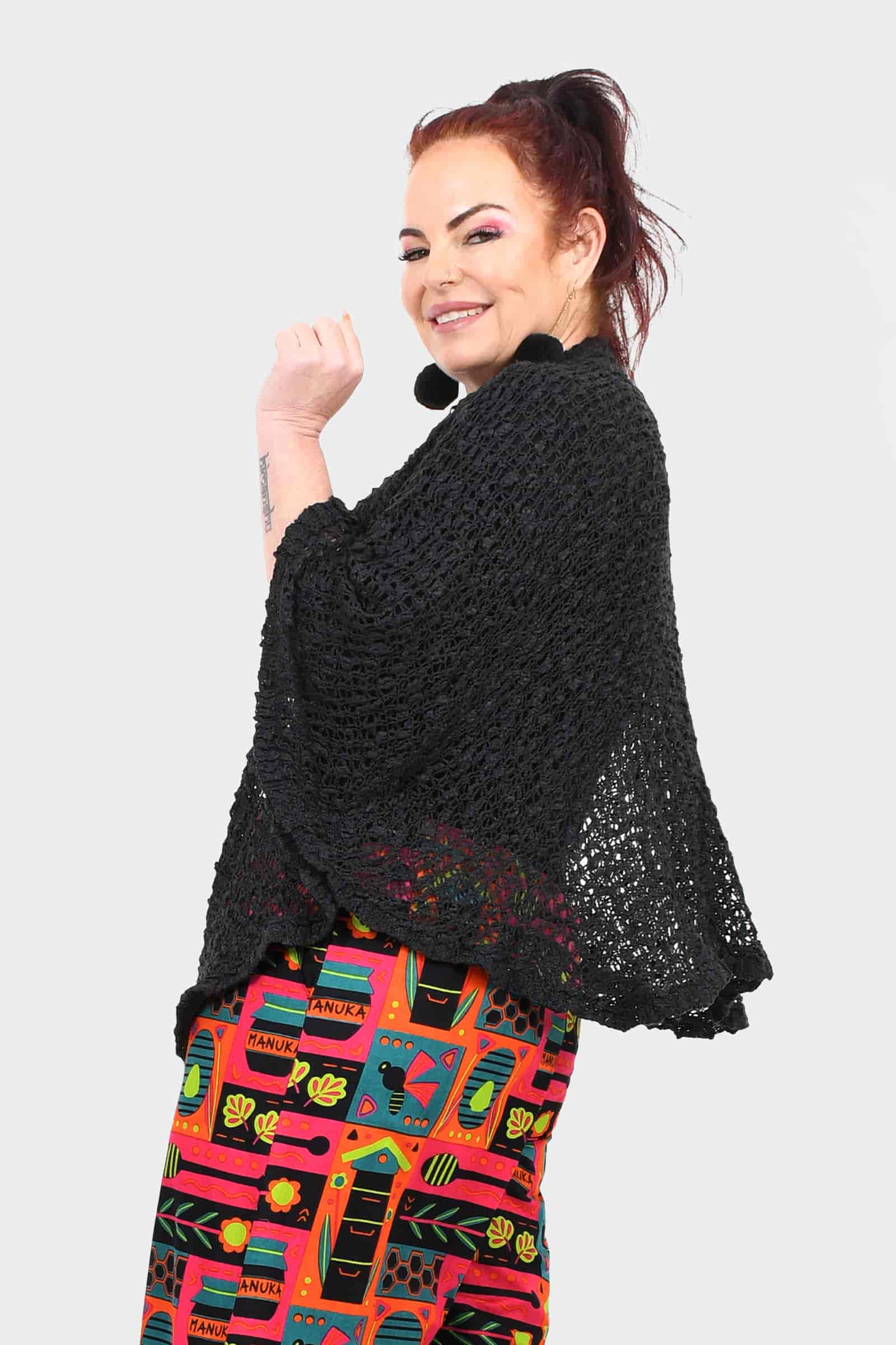 Black popcorn knit jacket, draped open front and wide sleeves