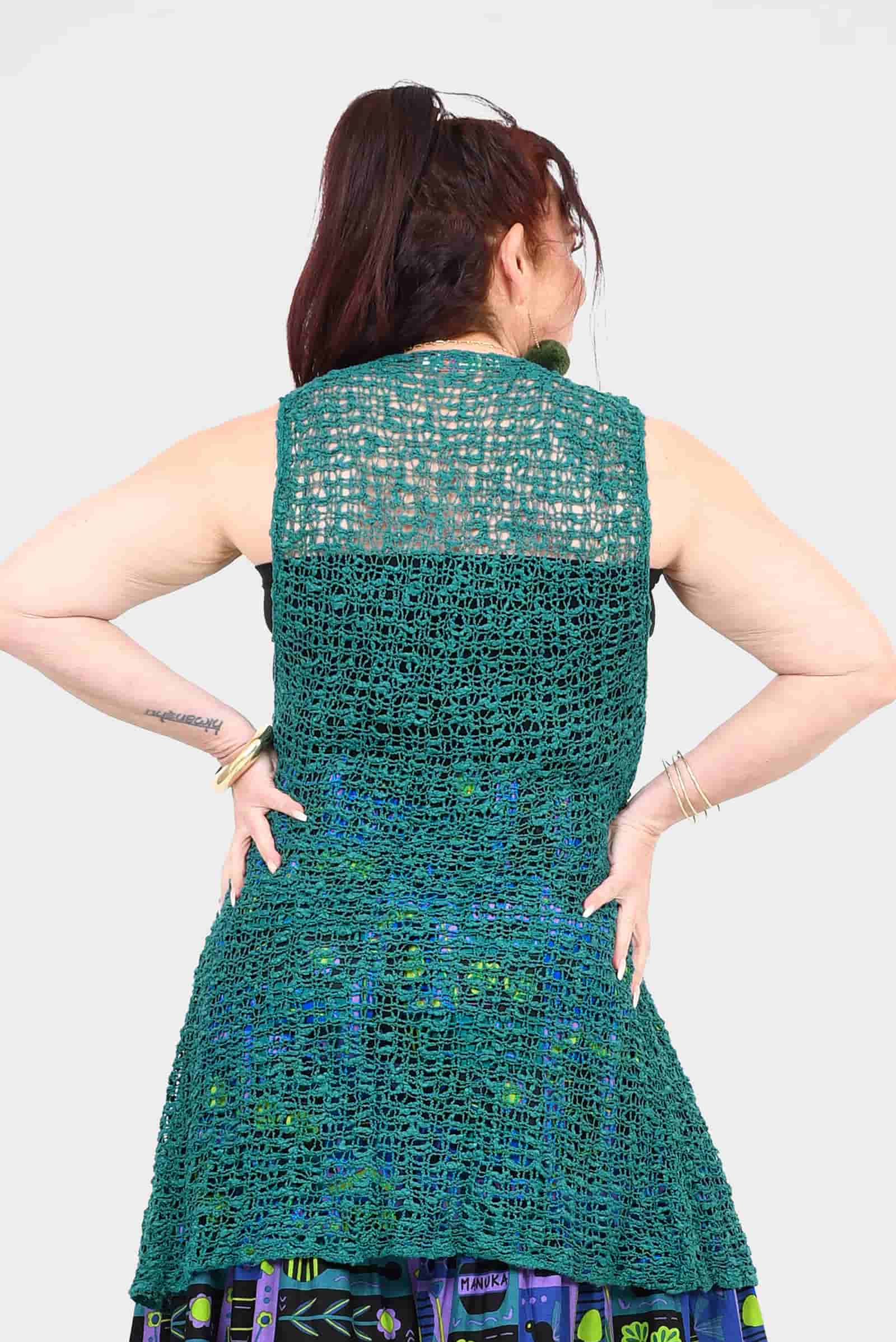 Forest green popcorn-knit sleeveless vest, back view, curved hem