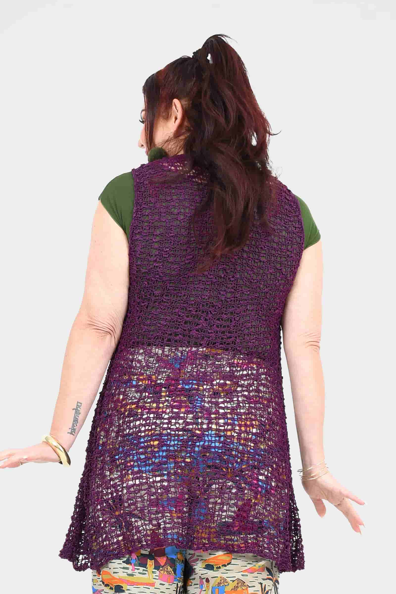 Back view of aubergine popcorn knit vest, sleeveless with flared hem