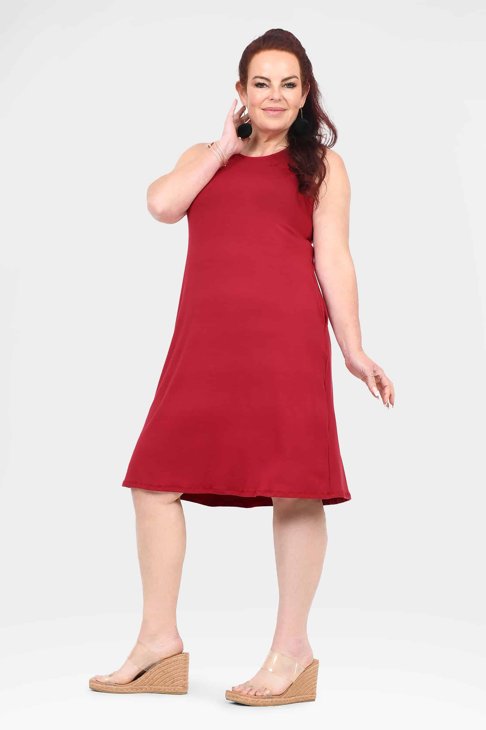 Jovie dress in dark red, sleeveless with round neck and A-line above-knee hem