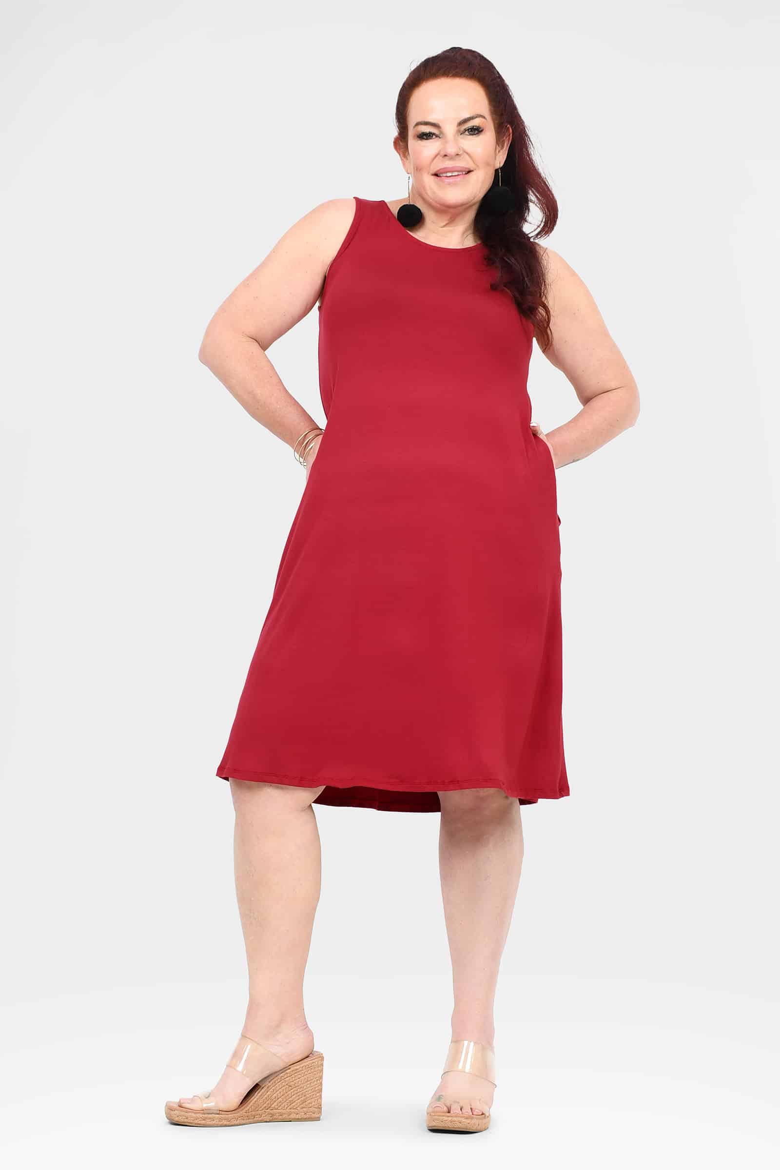 Jovie dress dark red sleeveless shift with round neck and softly curved hem