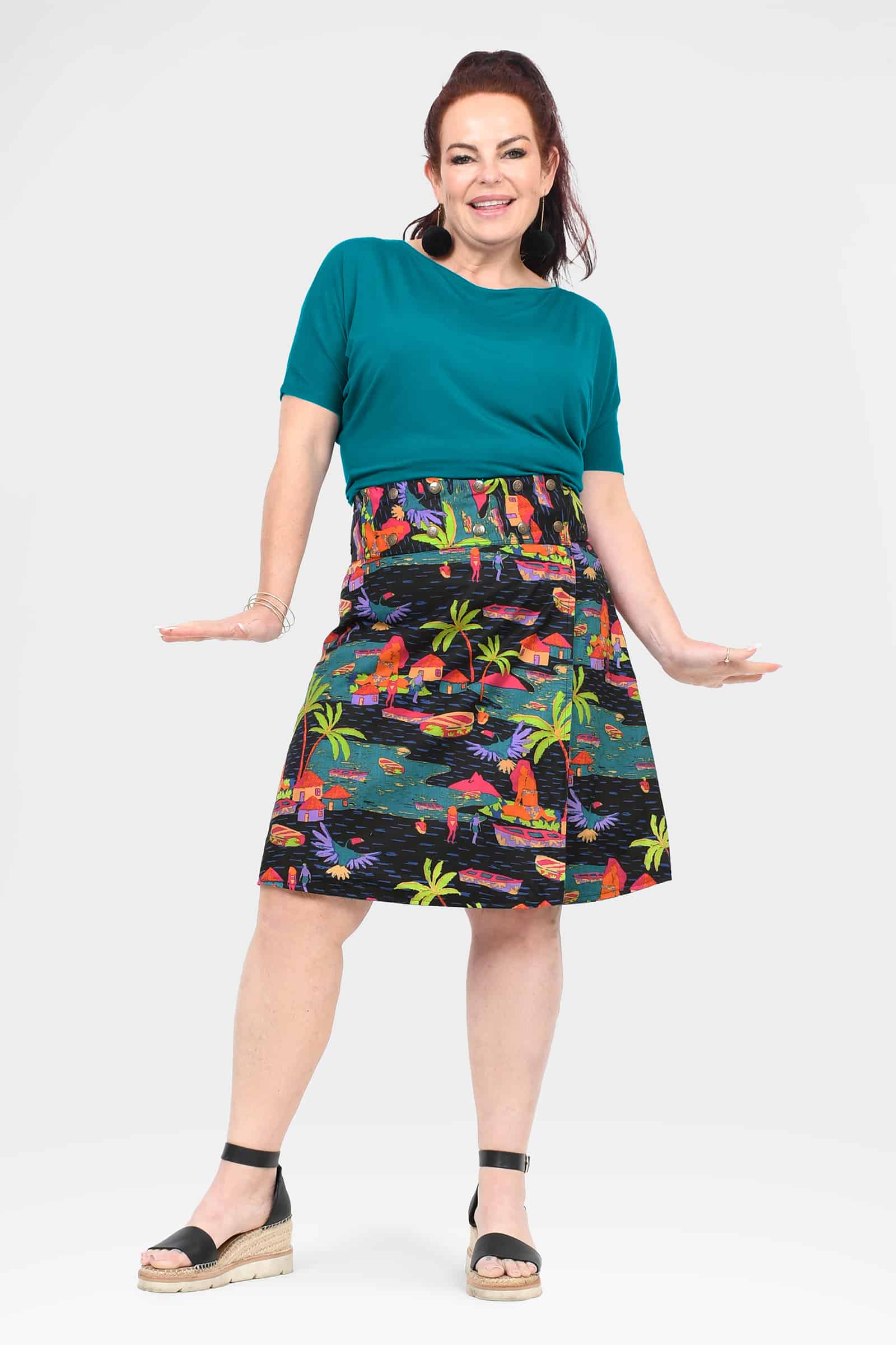 Long reversible button skirt with multicolor tropical print and teal waistband