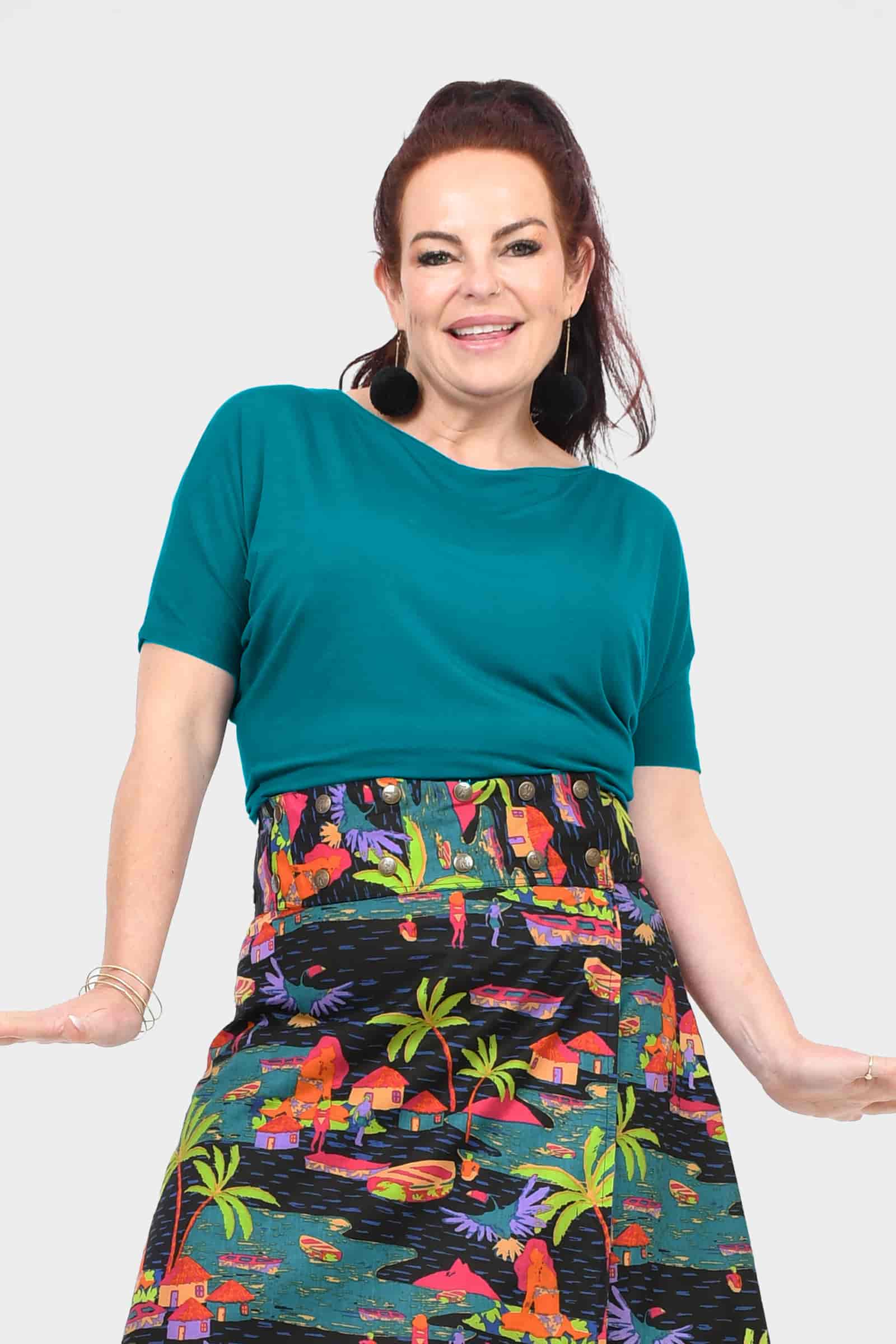Dark teal short-sleeve women’s top with round neckline, draped fit