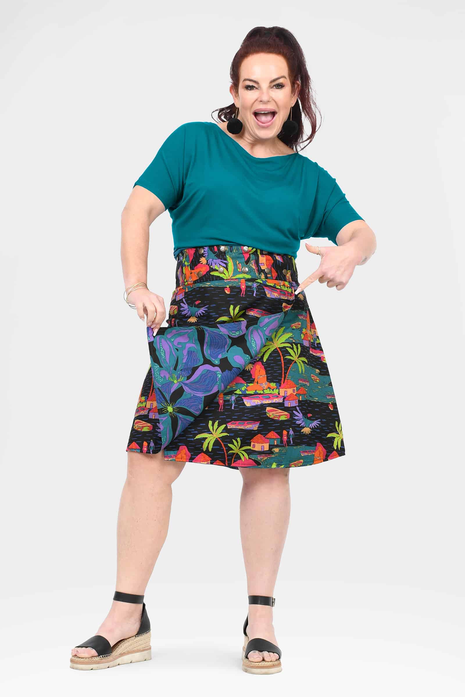 Long button skirt with multicolor tropical print and center button placket