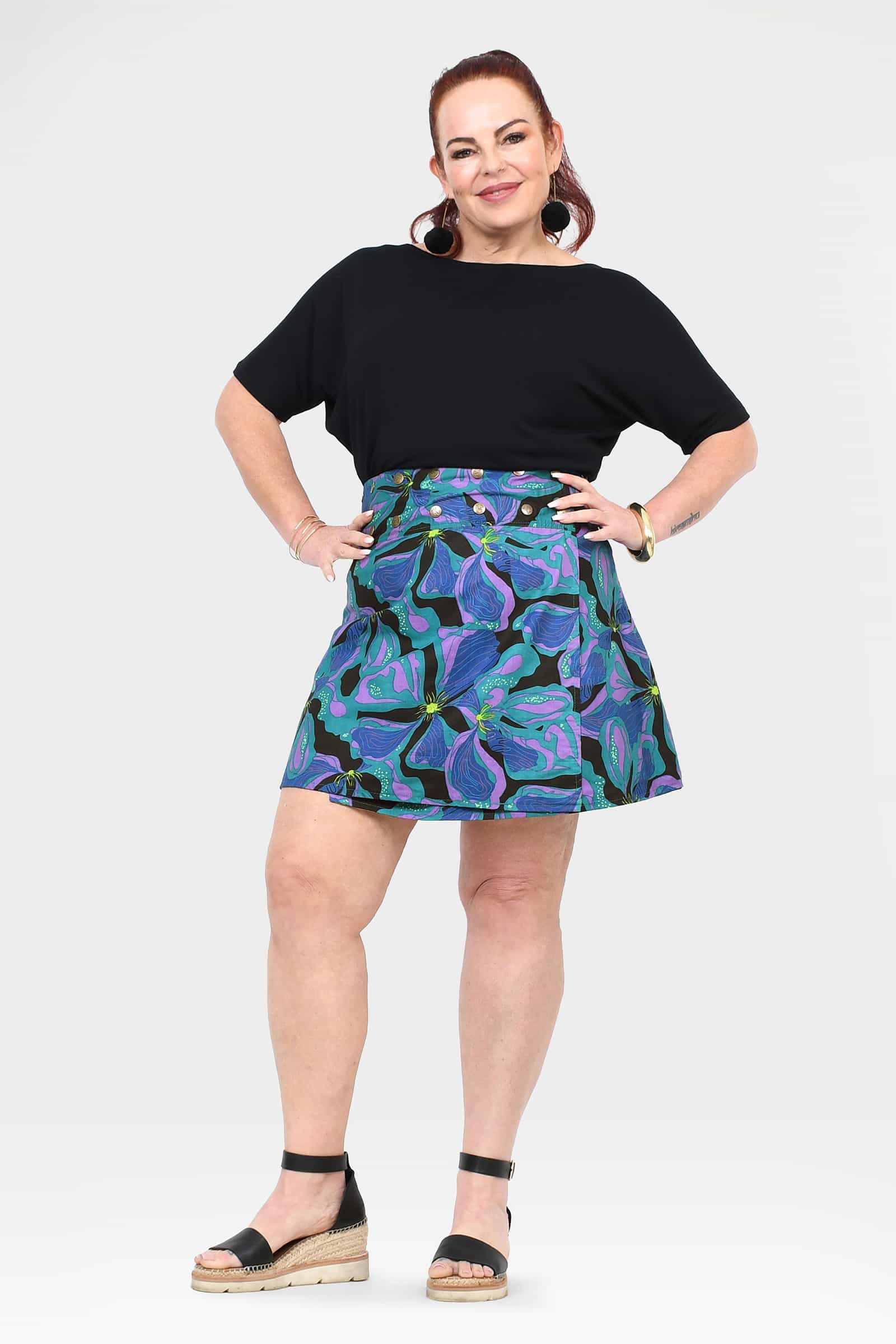 Reversible short button skirt, purple and teal floral print with buttoned waist