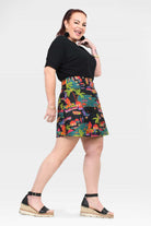 Reversible short button skirt, multicolor tropical print with visible black reversible side
