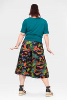 Havana 3/4 pants in tropical print, back view with wide flared legs