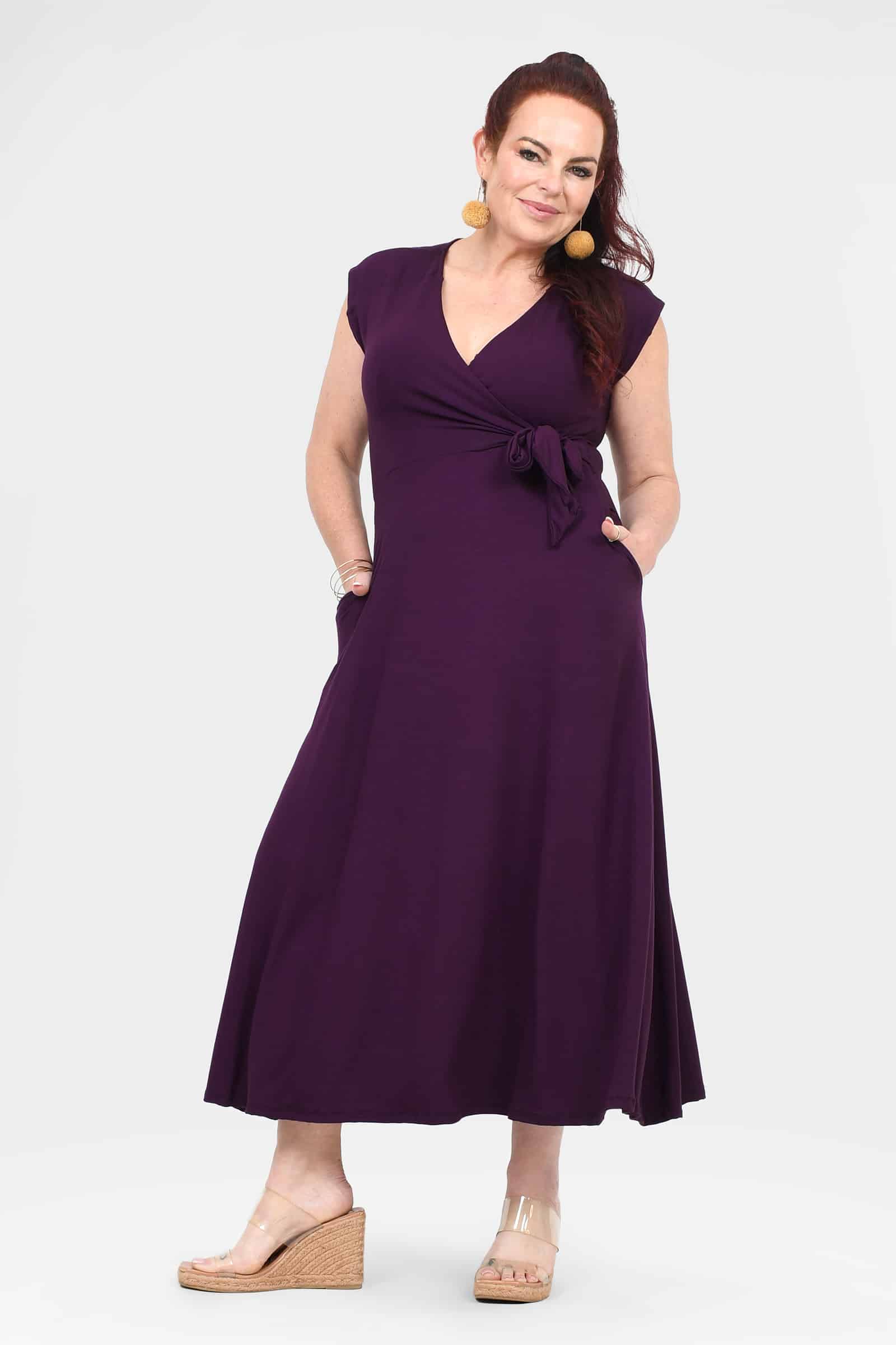 Aubergine sleeveless V-neck dress with bow waist tie and A-line skirt
