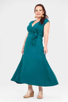 Dark teal sleeveless V-neck midi dress with tied waist and flared skirt