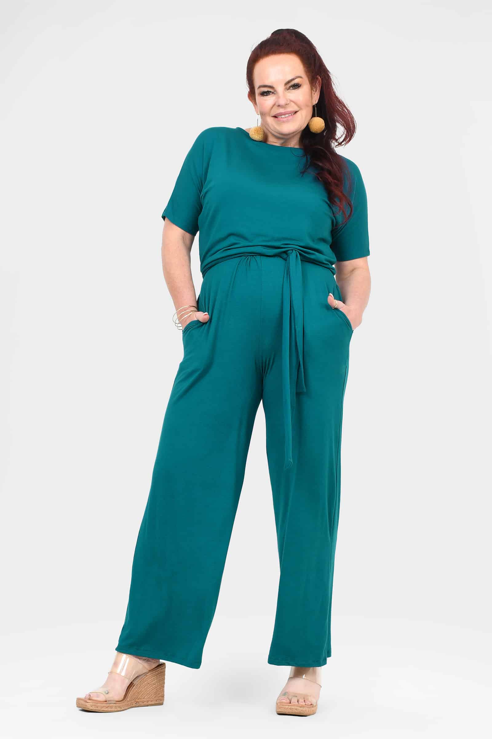 Dark teal short-sleeve tie-waist jumpsuit with wide-leg trousers