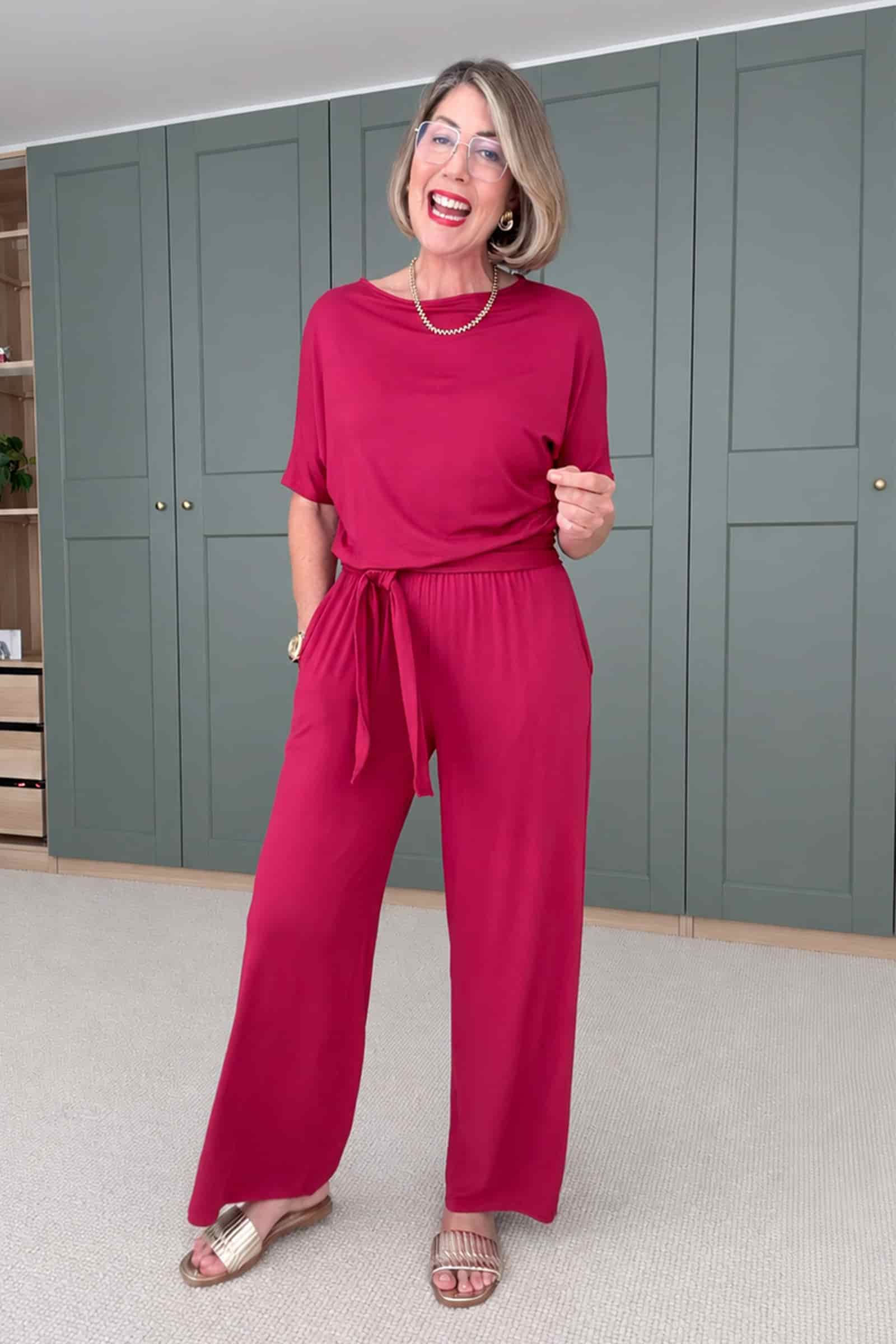 Women’s dark red tie-waist jumpsuit with short sleeves and wide-leg pants