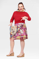 Reversible A-line skirt with pink tropical print and cream contrasting panel at side