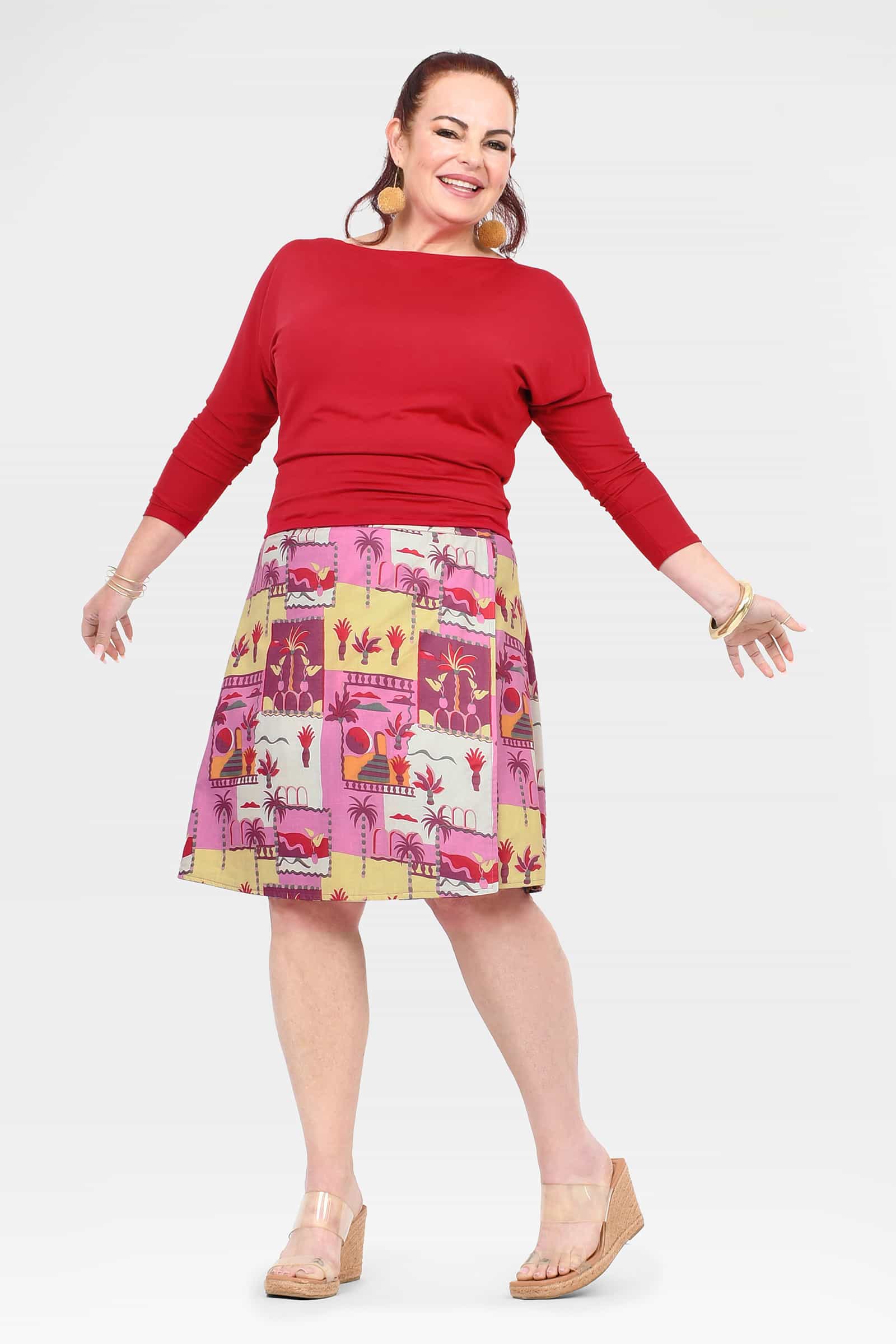 Women's mid-length A-line skirt, pink and multicolor print with elastic waistband