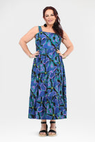 Teal and purple abstract-print sleeveless maxi dress with ruffled tiers and gathered waist