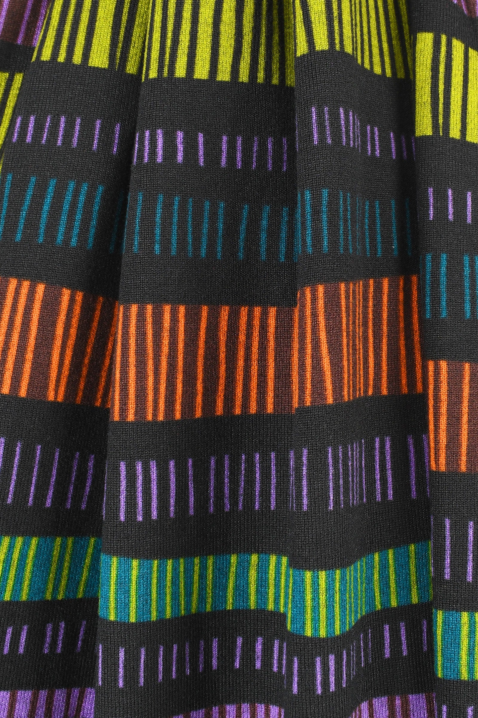 Close-up of fabric with multicolored striped pattern