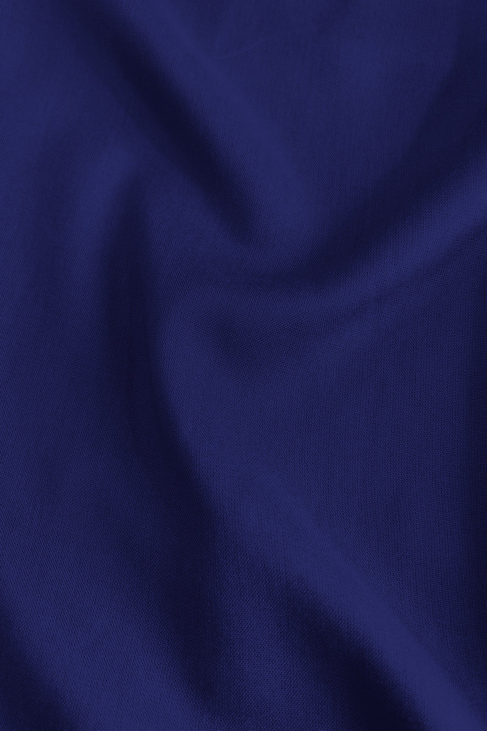 Dark blue fabric close-up with soft textured weave